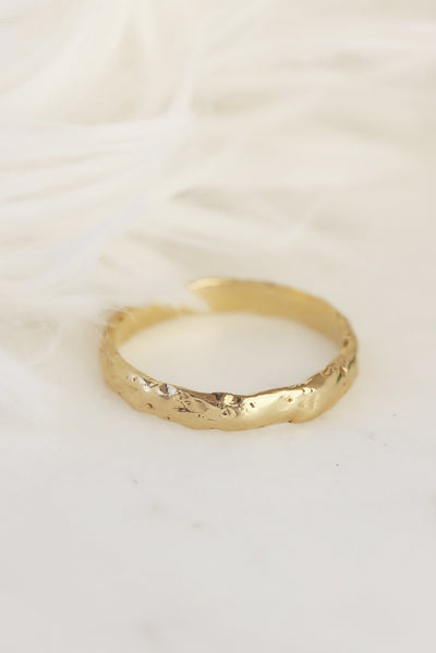An Easy To Wear, Rustic and Luxurious, Solid Gold Wedding Band