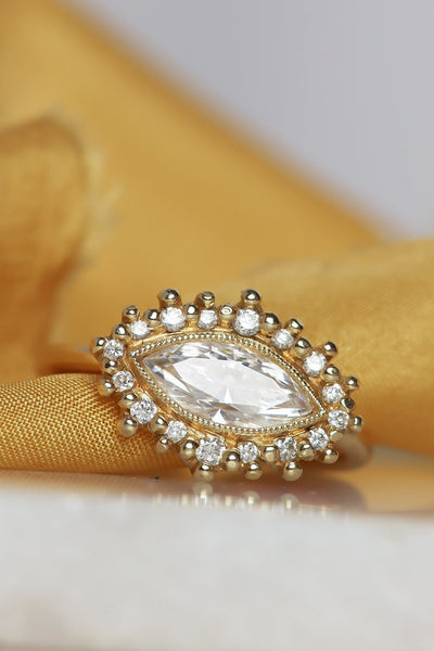 Marquise Moissanite and Diamond Halo Engagement Ring