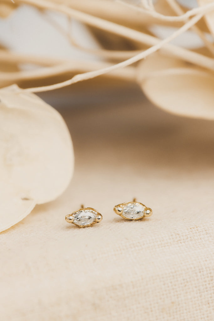 Buy Asymmetric Bloom Diamond Stud Earrings Online | CaratLane